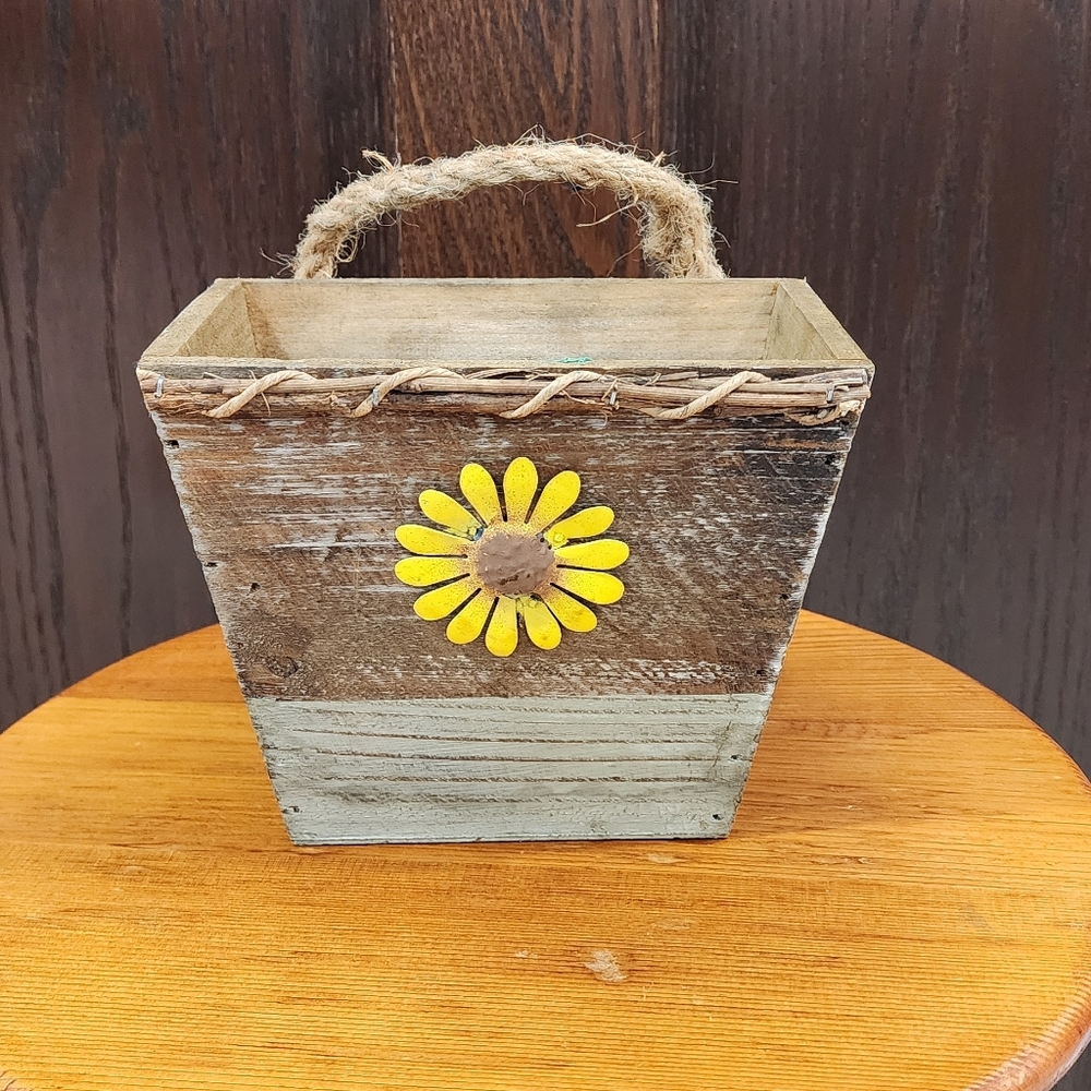 Rustic Wooden Planter with Yellow Flower Accent